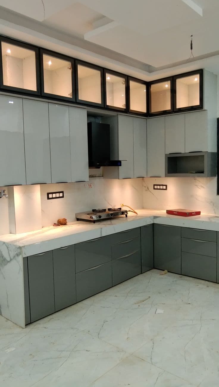 Modern modular kitchen with glossy cabinets