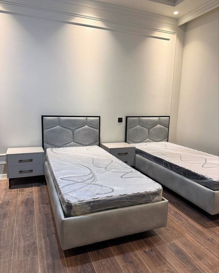 Modern twin bed design with minimal headboard