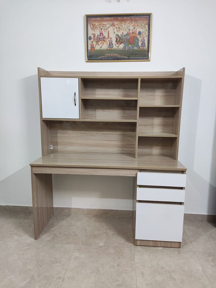 Compact study table with shelves and drawers
